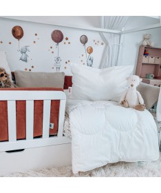 Zestaw Laura Paradies poduszka i kołdra dziecięcy - aranżacja w łóżeczku dziecięcym